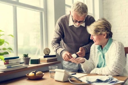 Senior Adult Taking Pills Medicine