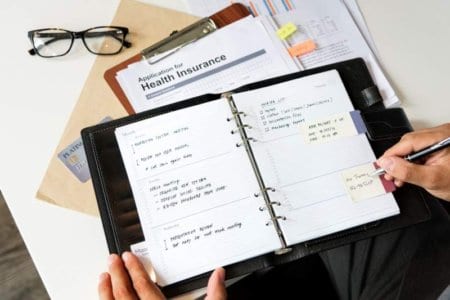 business-man-writing-mobile-phone-contact-concept-