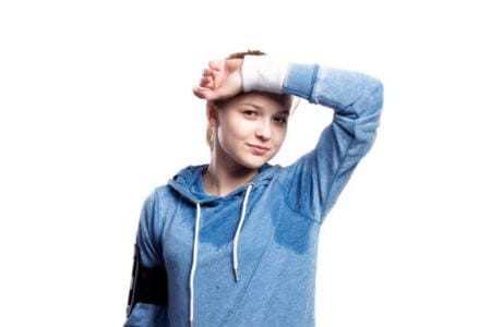 teenage-girl-in-blue-sweatshirt-studio-shot