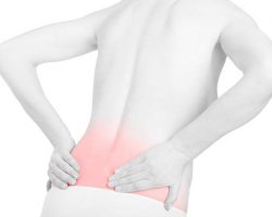 young-adult-woman-with-back-pain-red-area