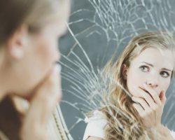girl-and-broken-mirror