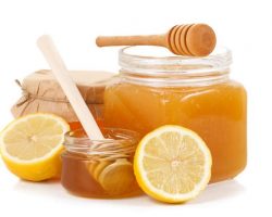 pot-of-honey-and-sliced-lemon