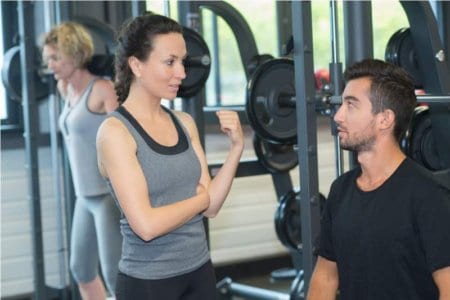 young-sporty-couple-in-gym