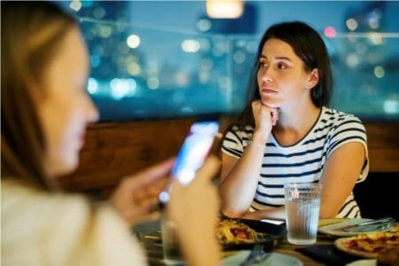 young-woman-being-bothered-by-a-friend
