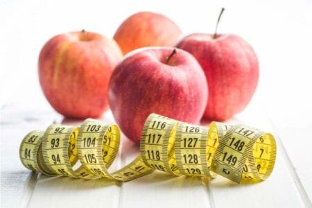 red-apple-and-measuring-tape