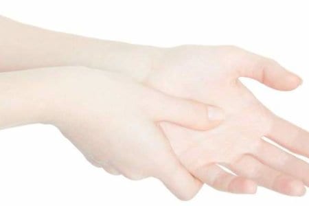 woman-hand-touching-with-thumb-the-painful-palm