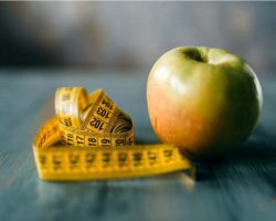 apple-and-measuring-tape-weight-loss-diet