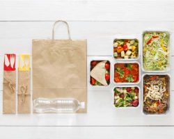 healthy-food-take-away-in-boxes-top-view-at-wood