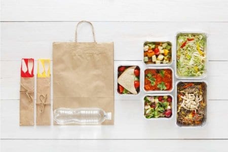 healthy-food-take-away-in-boxes-top-view-at-wood