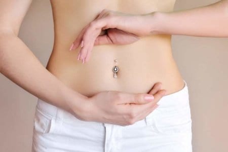 pregnancy-or-diet-concept-female-hands-protecting