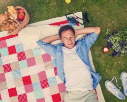 senior-man-having-a-picnic
