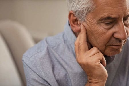 senior-man-with-hearing-problems