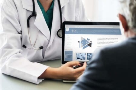doctor-suggesting-hospital-program-to-patient