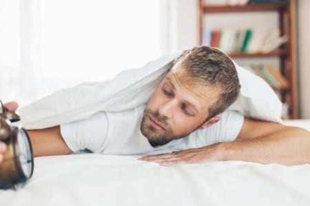 man-finding-it-difficult-to-wake-up