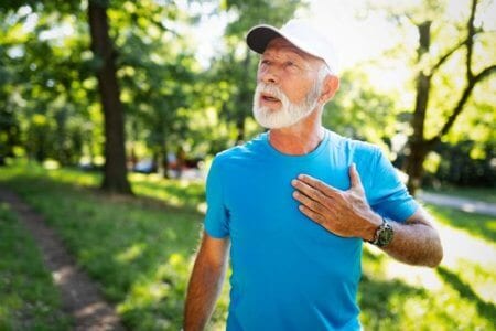 mature-man-exercising-outdoors-to-prevent