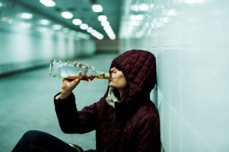homeless-alcoholism-woman-drinking-alcohol