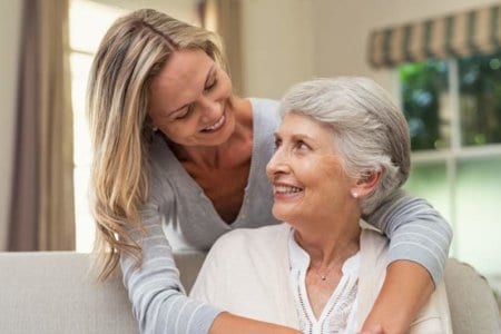 woman-embracing-senior-mother
