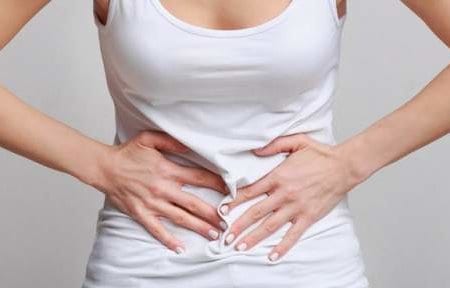 woman-with-stomachache-having-food-poisoning-grey