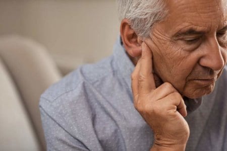 senior-man-with-hearing-problems