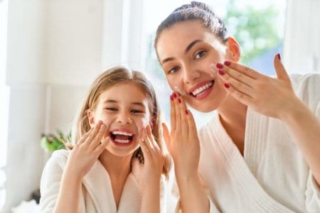 mother-and-daughter-caring-for-skin