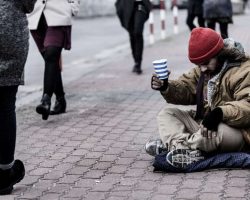 hopeless-beggar-on-the-sidewalk