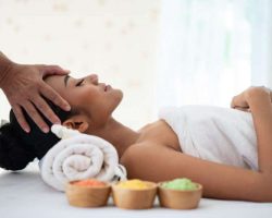 young-woman-enjoying-massage-in-spa-salon